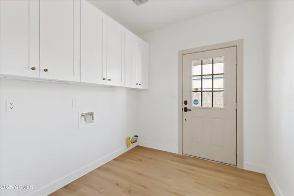 a kitchen with stainless steel appliances a refrigerator stove and sink