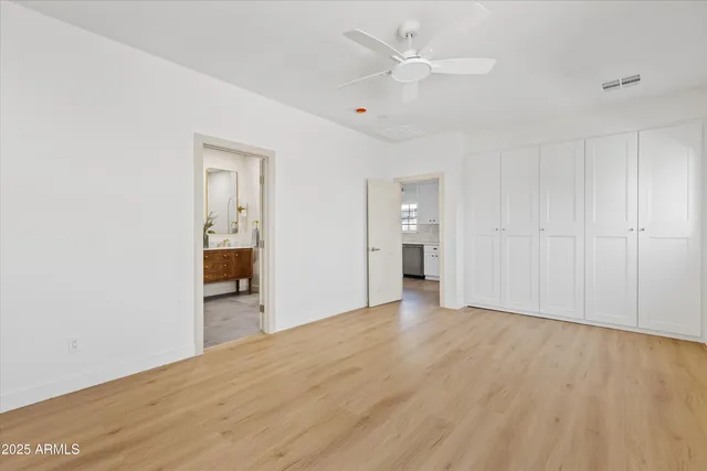 a kitchen with stainless steel appliances a refrigerator stove and sink