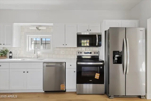 a view of a backyard of a house