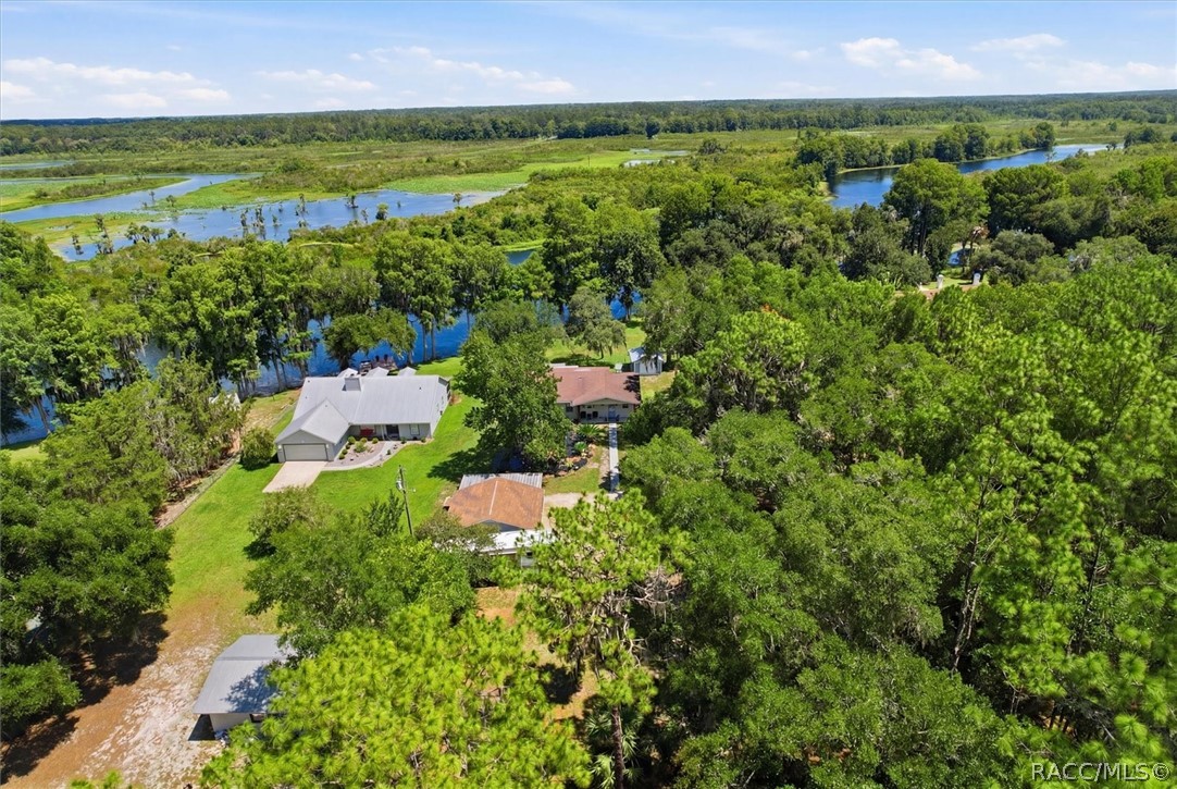 4099 West Ridge Court Dunnellon, FL 34433 - Photo 48 of 49 Another aerial view of home, shop and property.