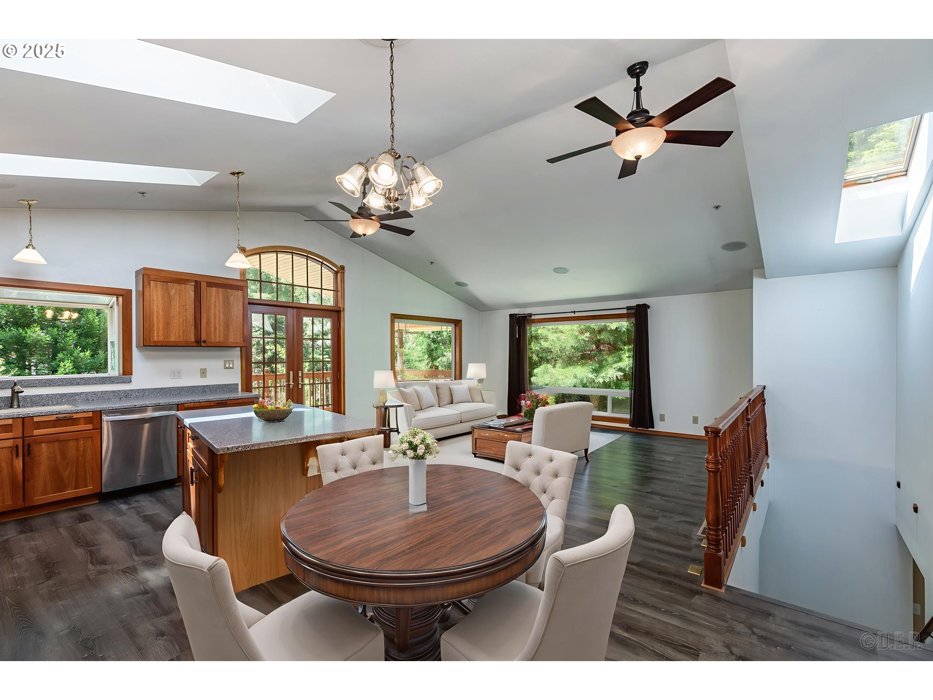 25363 Wonderly Road Rainier, OR 97048 - Photo 11 of 40 a view of a dining room with furniture window and wooden floor