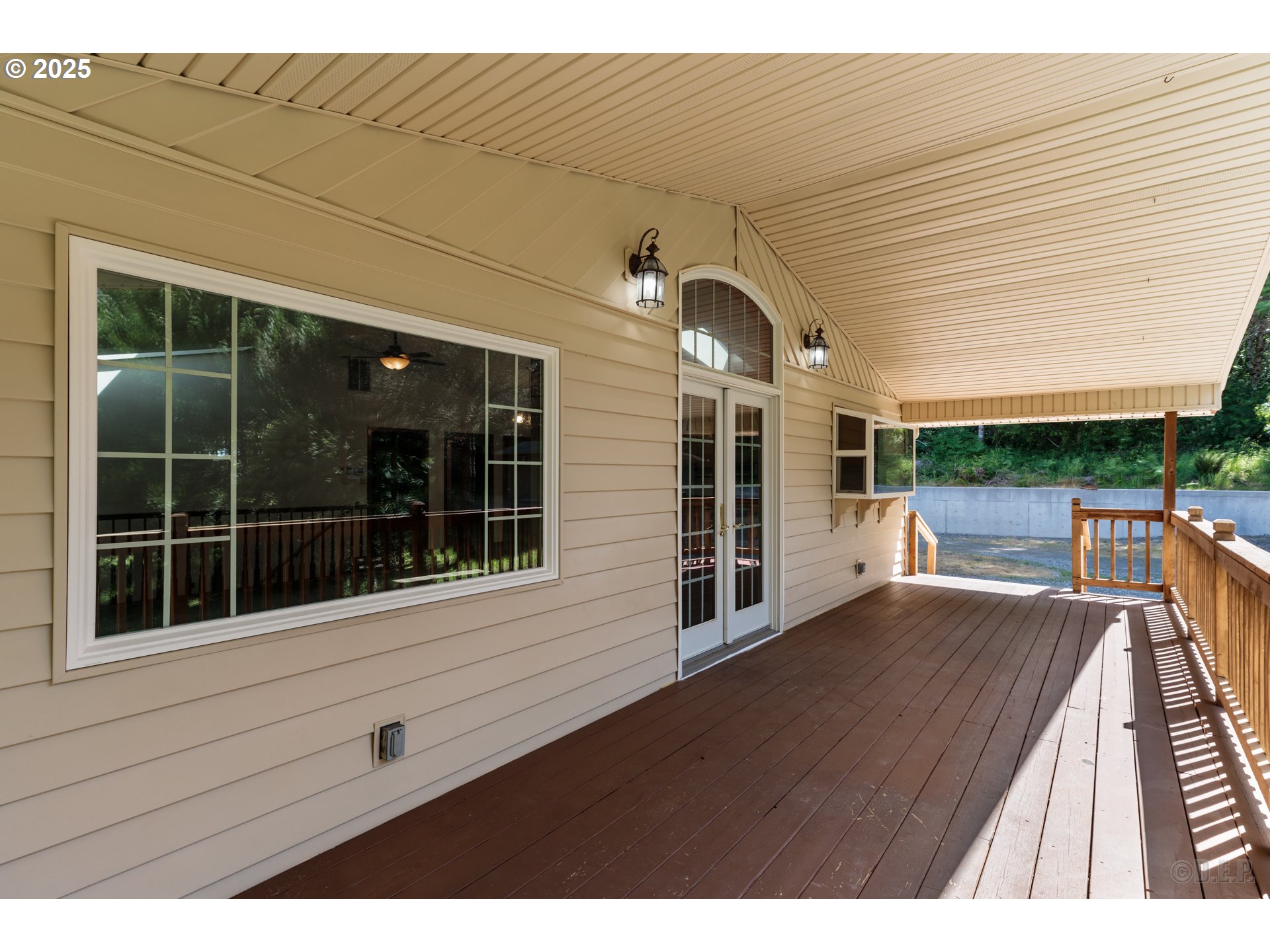 25363 Wonderly Road Rainier, OR 97048 - Photo 13 of 40 a view of a house with a porch