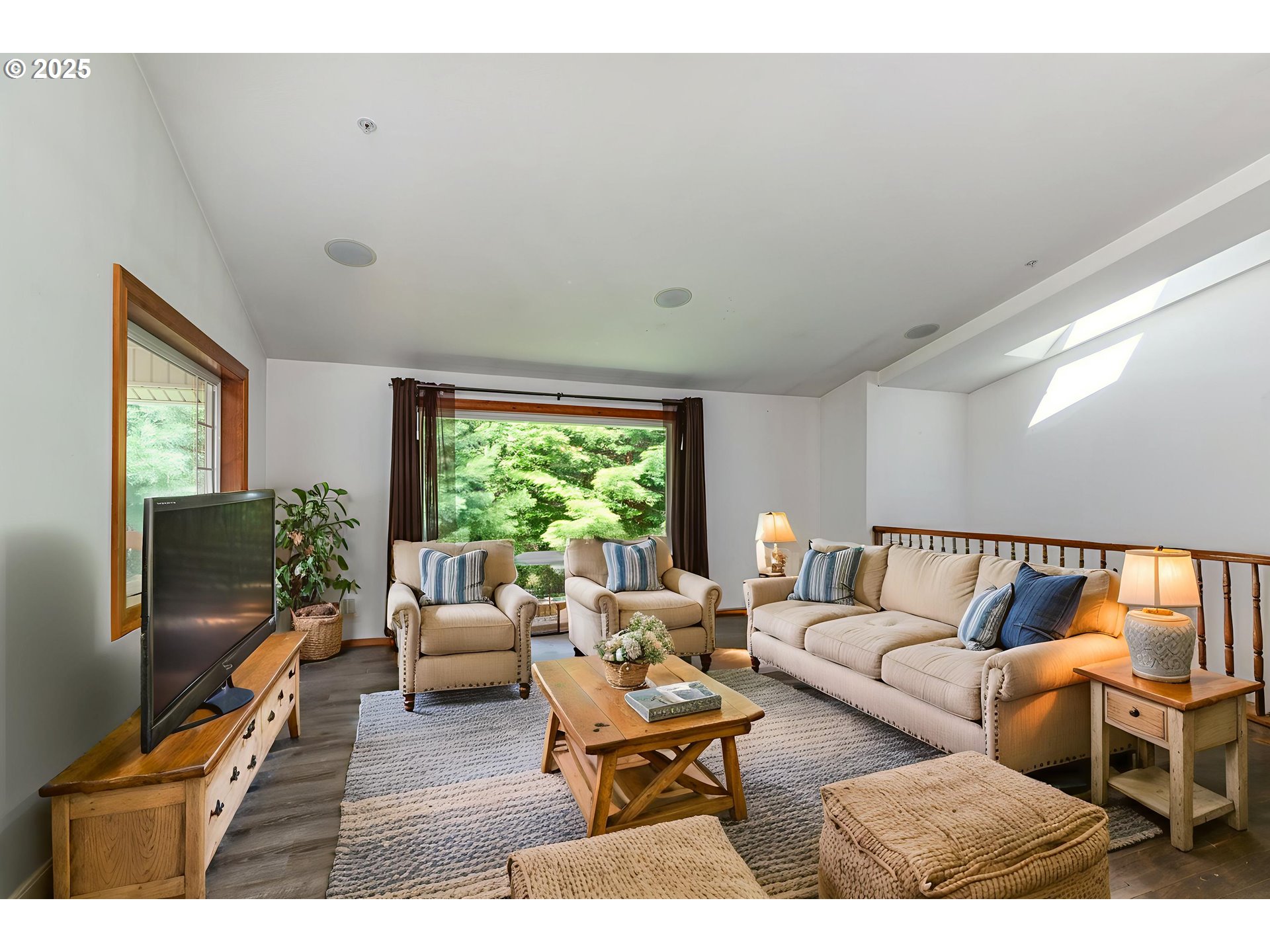 25363 Wonderly Road Rainier, OR 97048 - Photo 5 of 40 a living room with furniture and a flat screen tv