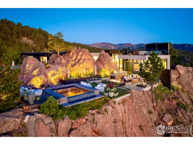 a view of a terrace with a table and chairs