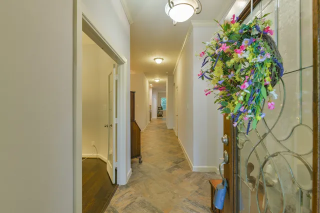 a view of a hallway with flowers