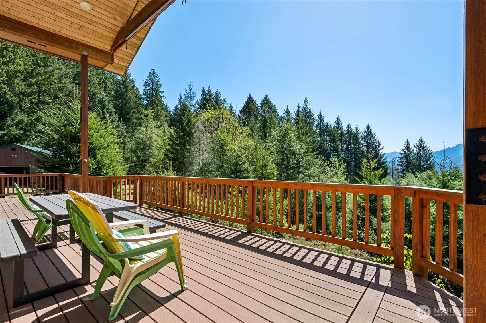 0 Boyd Road Randle, WA 98377 - Photo 22 of 39 a view of a wooden deck with furniture