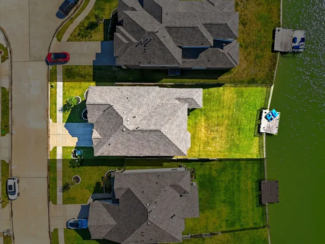 an aerial view of a house with a garden