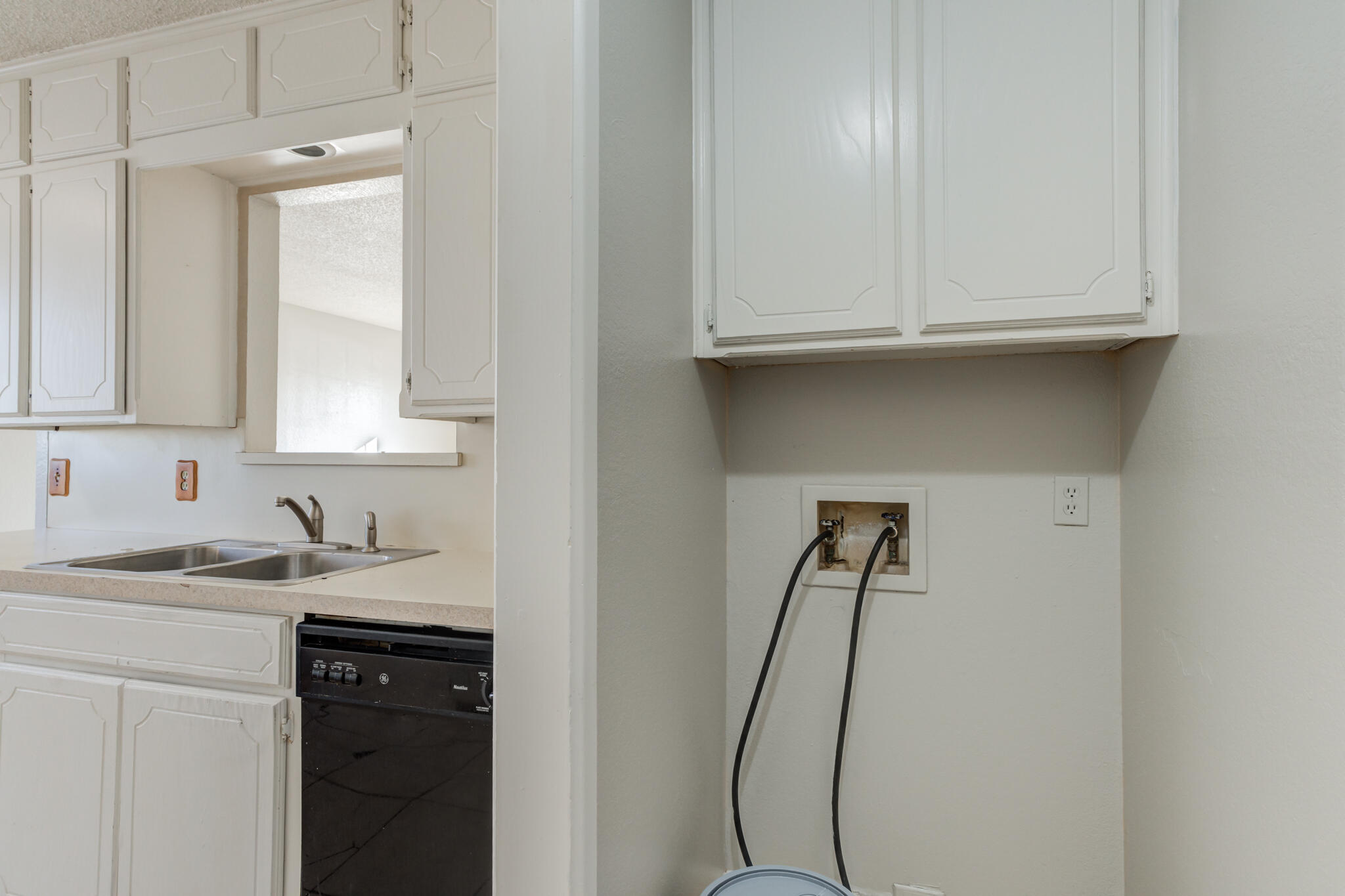 6212 22nd Street Lubbock, TX 79407 - Photo 13 of 24 a bathroom with a sink a vanity and a mirror