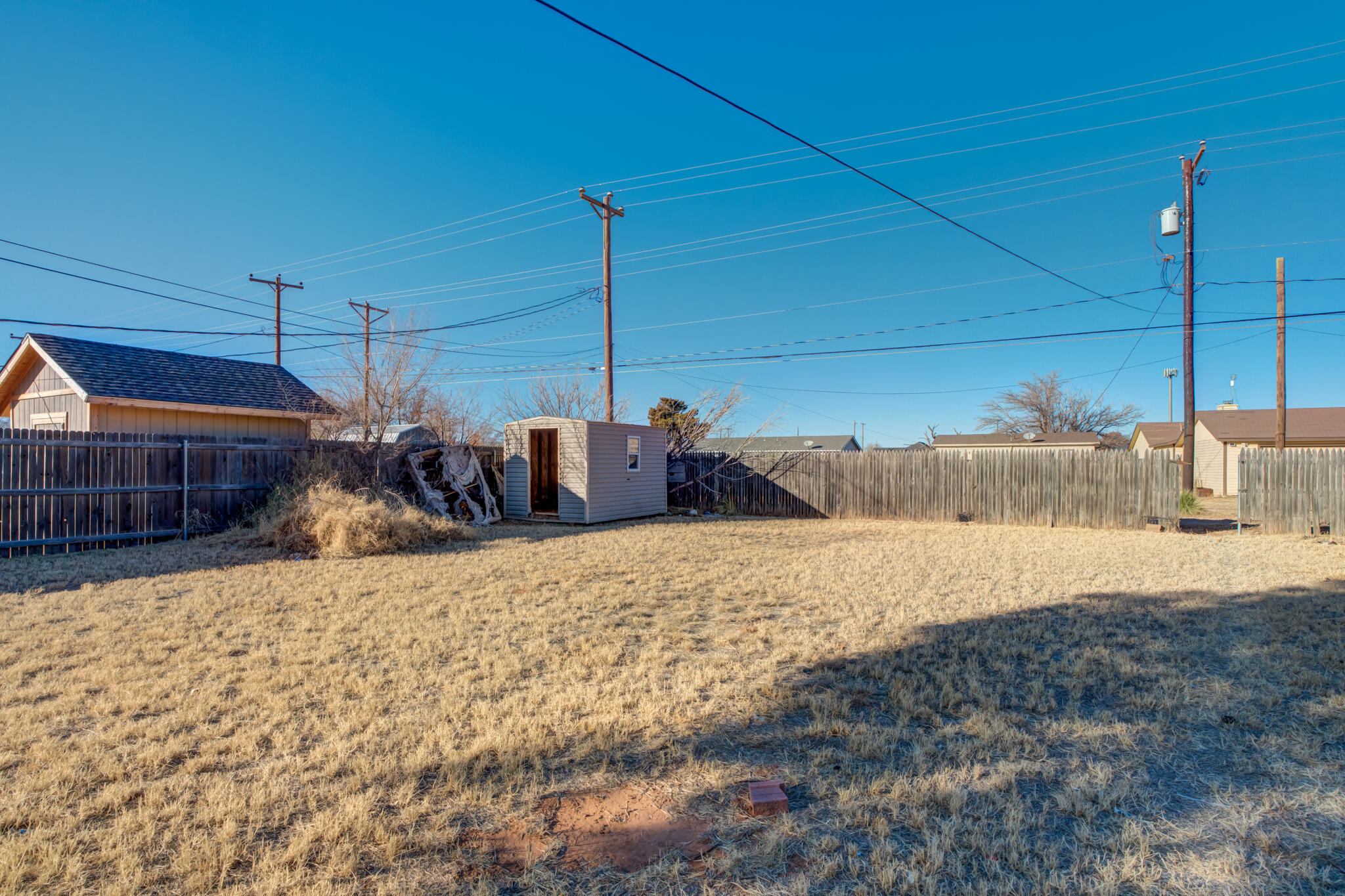 6212 22nd Street Lubbock, TX 79407 - Photo 23 of 24 a bed room with a bed