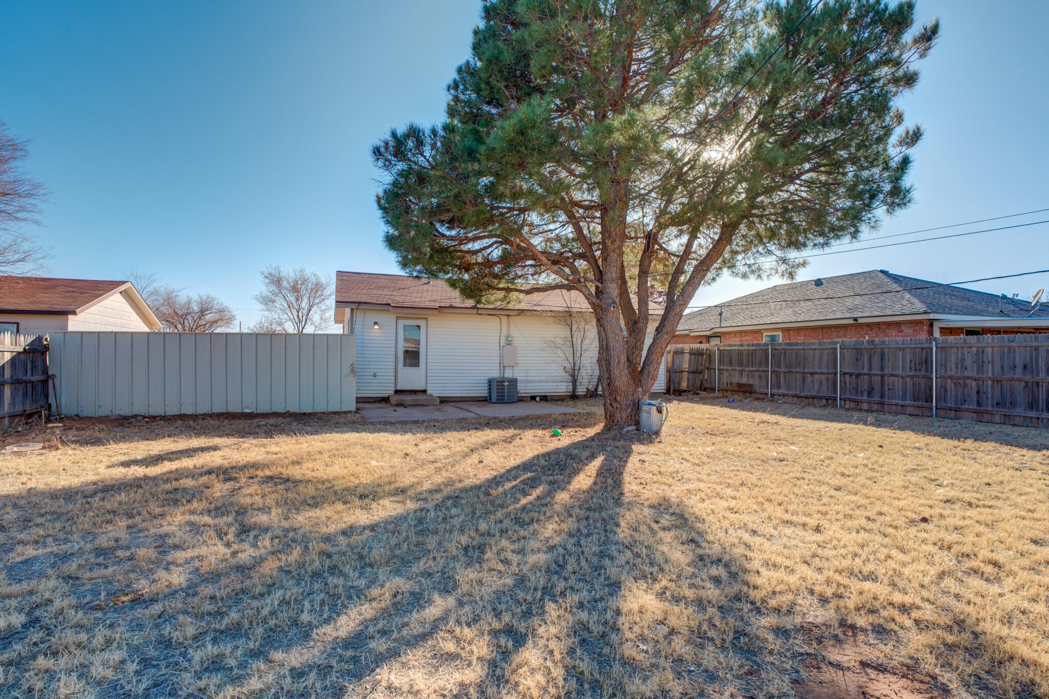 6212 22nd Street Lubbock, TX 79407 - Photo 24 of 24 a view of a house with a yard and wooden fence