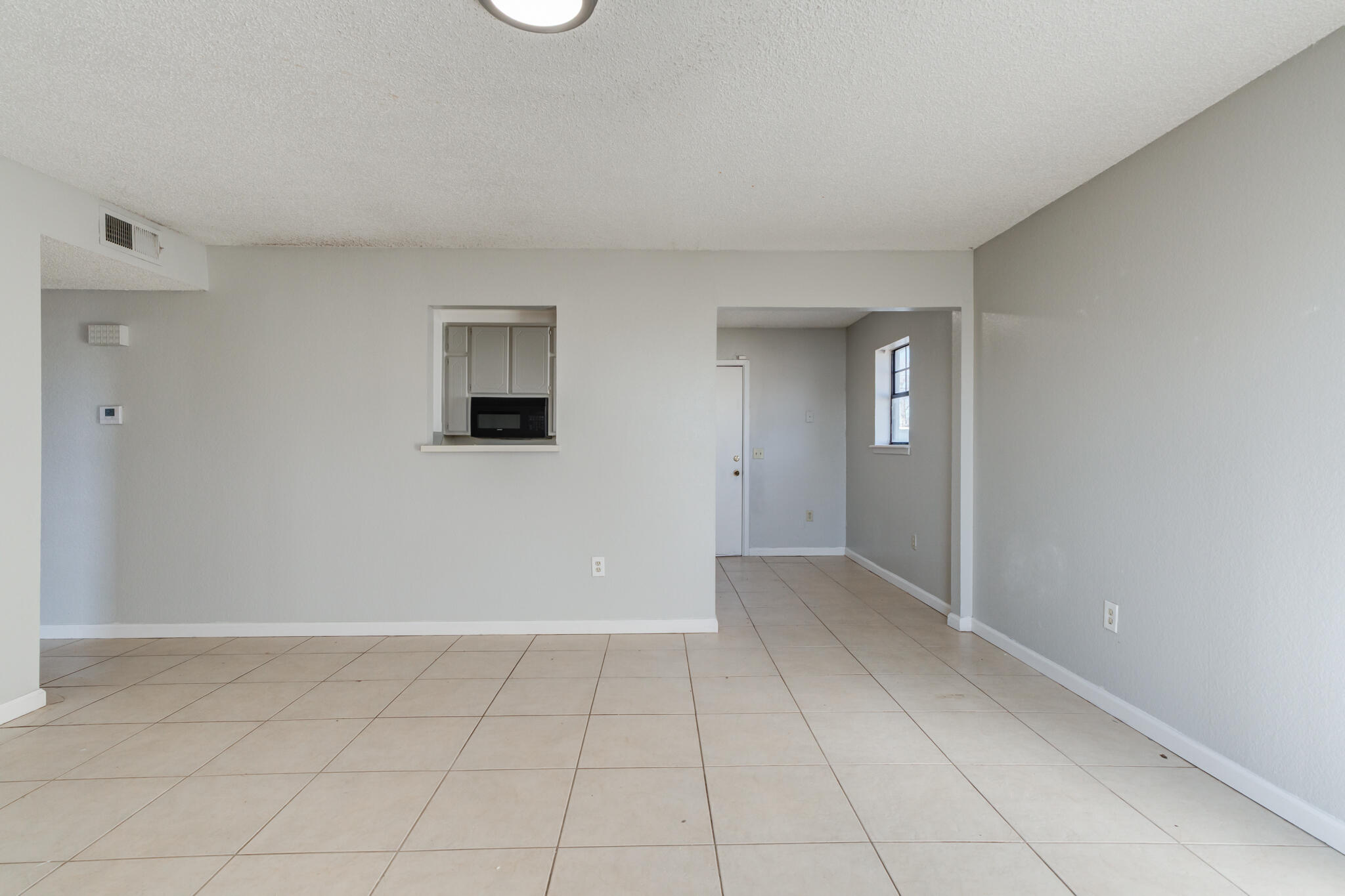 6212 22nd Street Lubbock, TX 79407 - Photo 5 of 24 wooden floor in an empty room