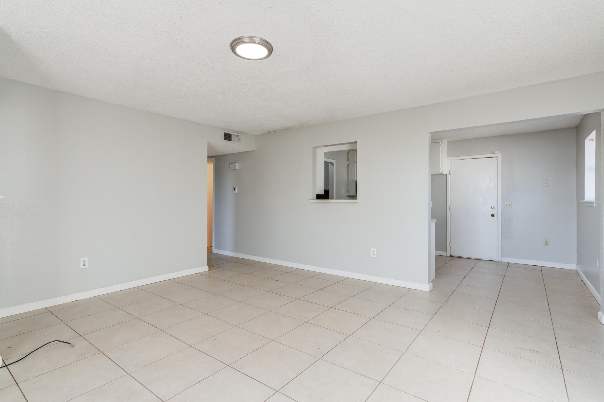 6212 22nd Street Lubbock, TX 79407 - Photo 6 of 24 an empty room with entrance and shower