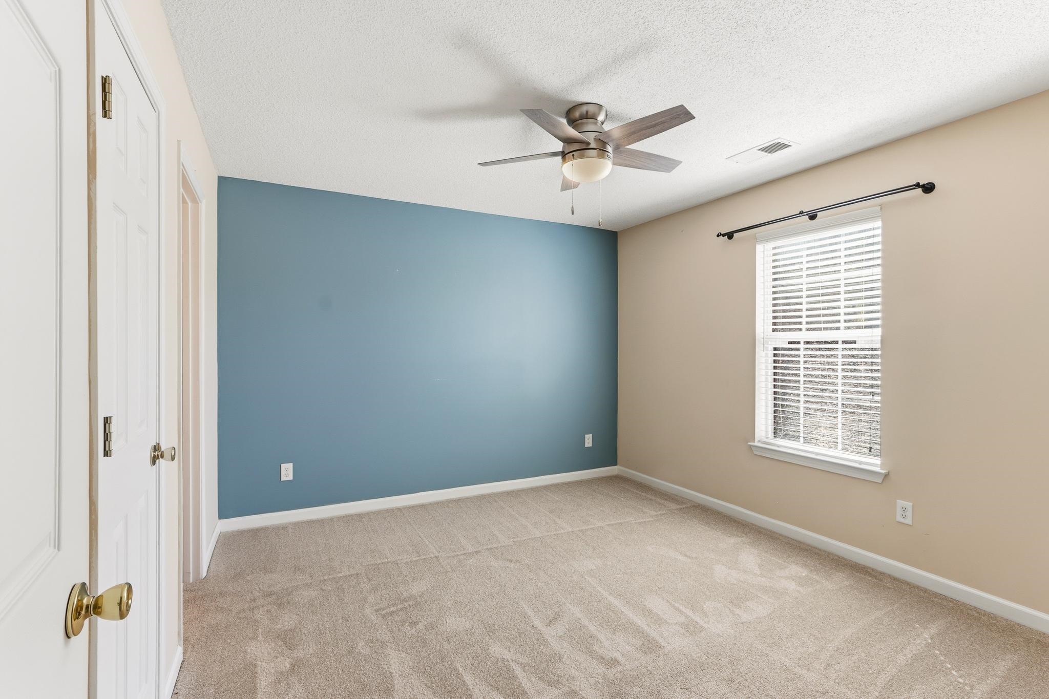 1066 Whitten Road Cordova, TN 38018 - Photo 20 of 30 a view of an empty room with a window