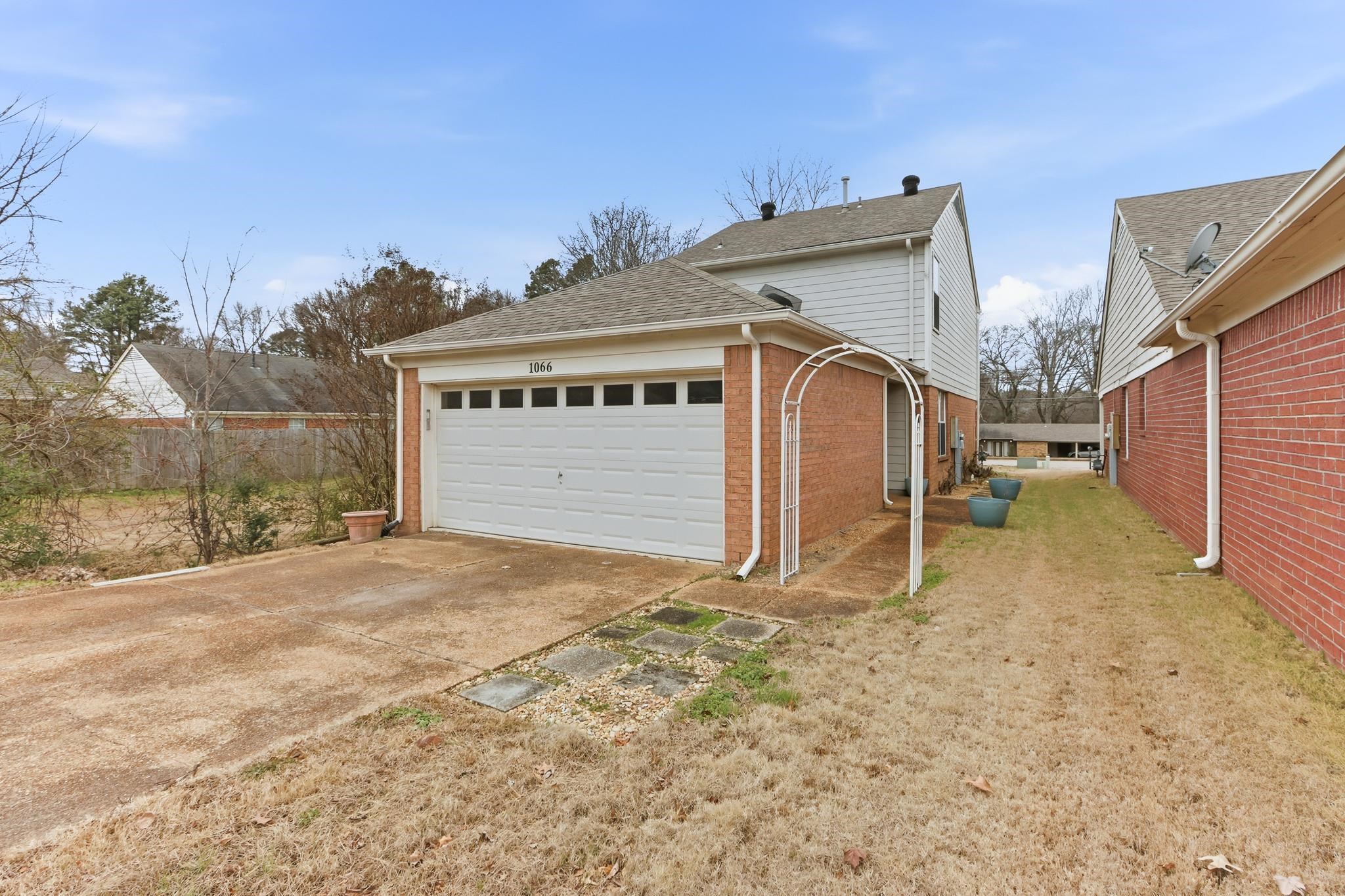 1066 Whitten Road Cordova, TN 38018 - Photo 28 of 30 a view of a house with a yard
