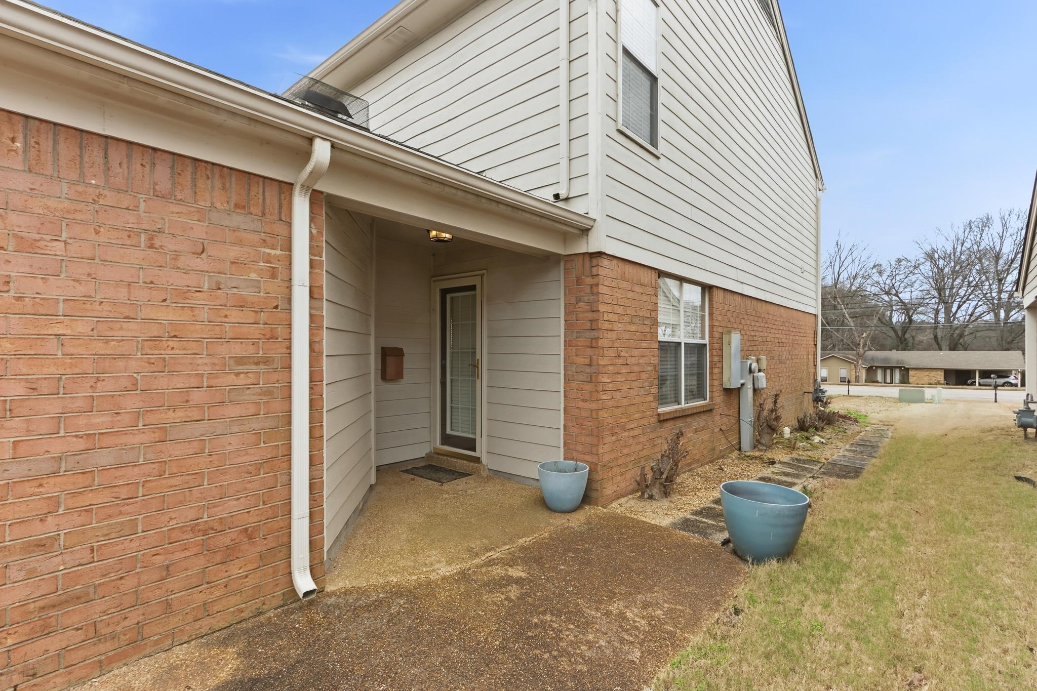 1066 Whitten Road Cordova, TN 38018 - Photo 29 of 30 a view of a small house with backyard