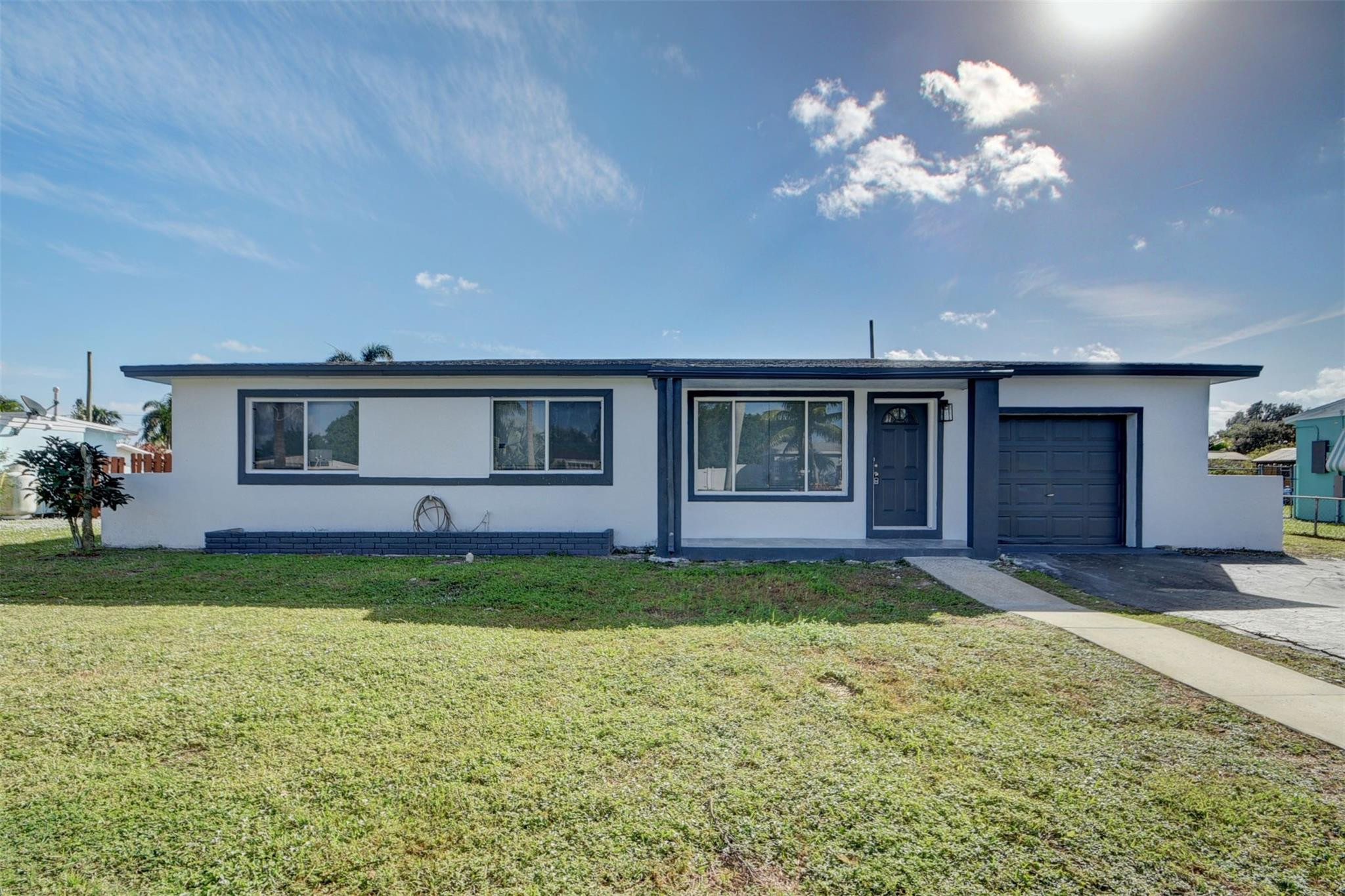 325 Mid Pines Road Palm Springs, FL 33461 - Photo 1 of 46 Photo 1