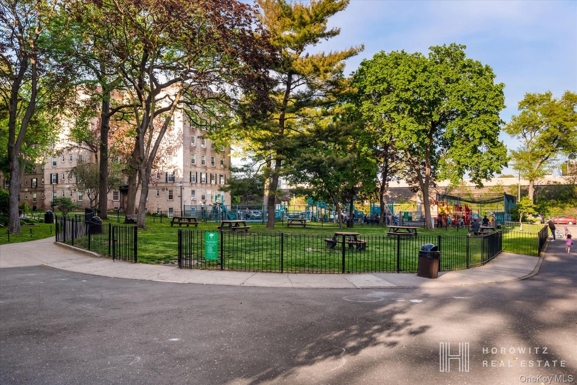 55-03 31st Avenue, Unit C6K Queens, NY 11377 - Photo 10 of 13 a view of a park with large trees