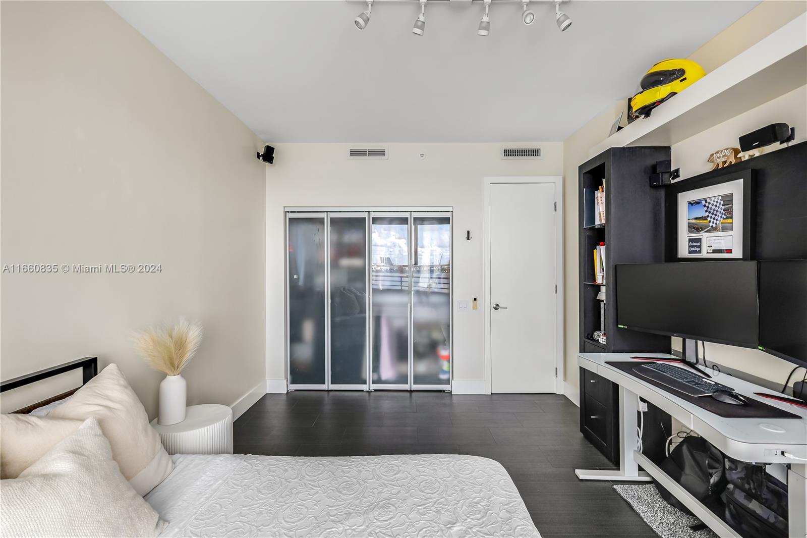 888 Brickell Key Drive, Unit 710 Miami, FL 33131 - Photo 15 of 45 a living room with a couch and a table