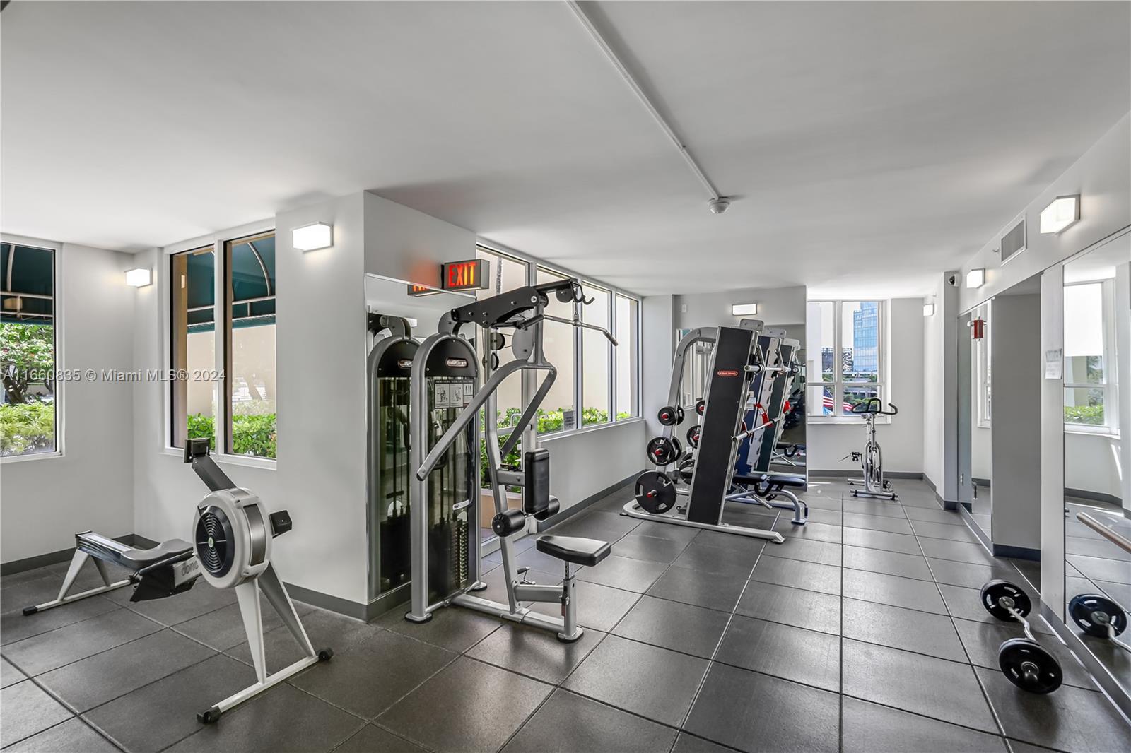 888 Brickell Key Drive, Unit 710 Miami, FL 33131 - Photo 38 of 45 a view of a room with gym equipment