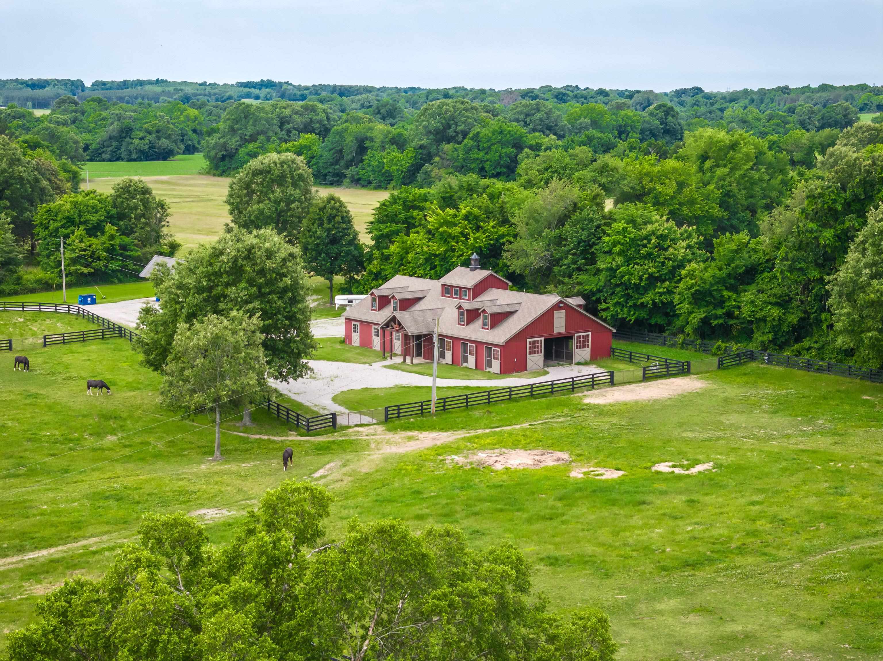 6085 Yum Yum Road Somerville, TN 38068 - Photo 2 of 40 a view of a house with a yard