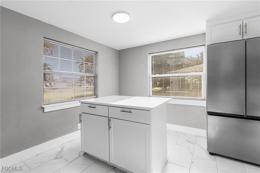 4472 East Riverside Drive Fort Myers, FL 33905 - Photo 4 of 17 a utility room with dryer and washer