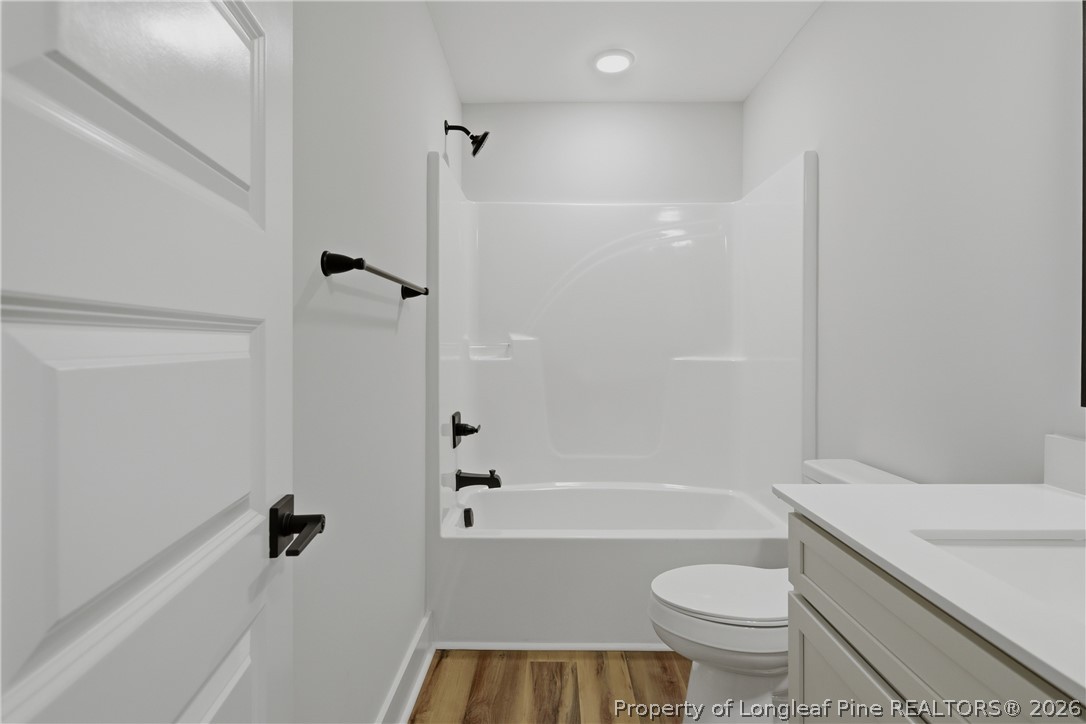 3931 Hamilton Street Hope Mills, NC 28348 - Photo 41 of 50 a bathroom with a sink toilet and shower