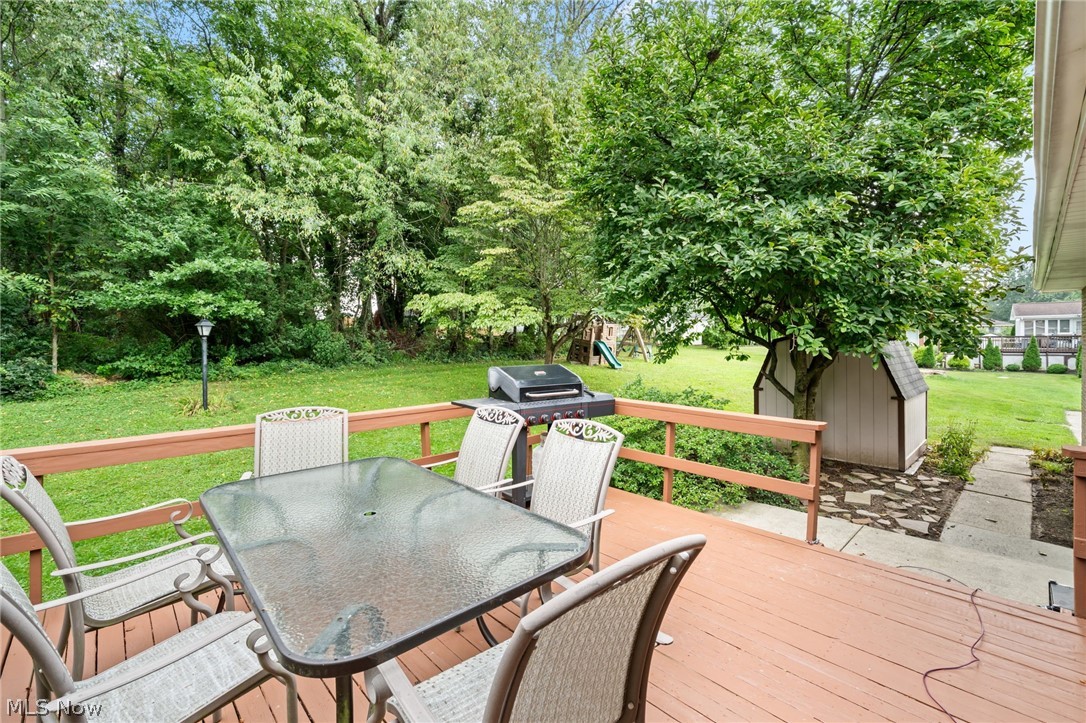 2591 Woodview Road Uniontown, OH 44685 - Photo 31 of 46 Enjoy end of summer drinks heading into fall out on your back deck.