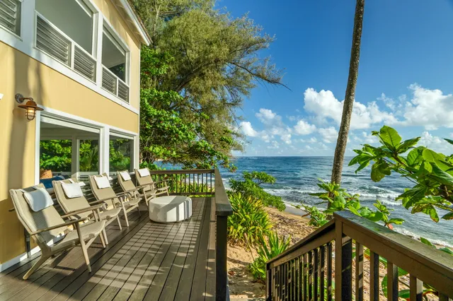 a view of balcony with furniture