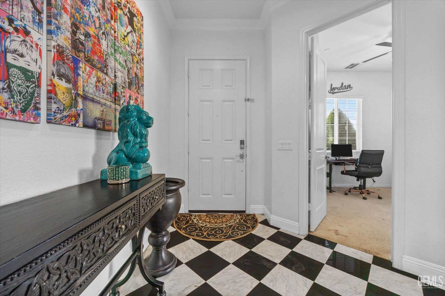 Undisclosed Address Bakersfield, CA 93314 - Photo 12 of 56 a view of a bedroom with a potted plant and wooden floor