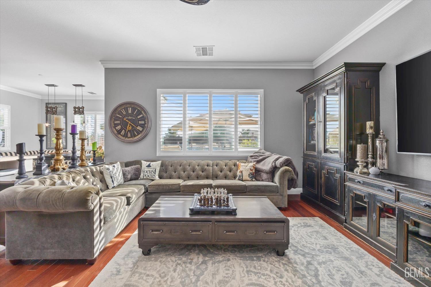 Undisclosed Address Bakersfield, CA 93314 - Photo 20 of 56 a living room with furniture and a large window