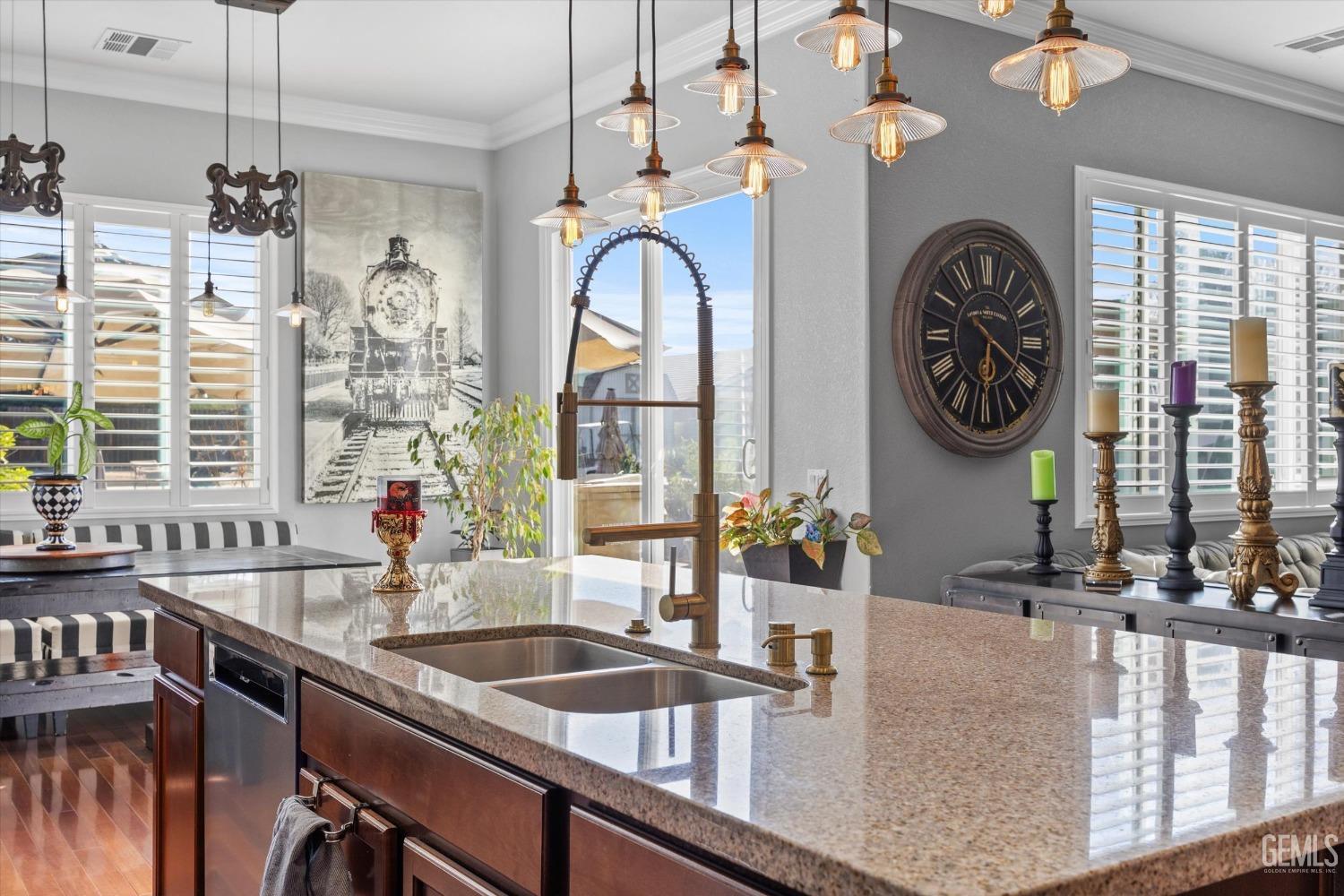 Undisclosed Address Bakersfield, CA 93314 - Photo 25 of 56 a kitchen with stainless steel appliances granite countertop a sink a counter space and a window