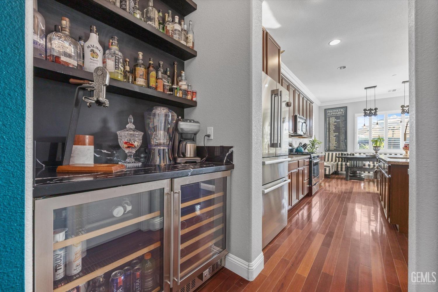 Undisclosed Address Bakersfield, CA 93314 - Photo 27 of 56 a kitchen with stainless steel appliances granite countertop a stove and cabinets
