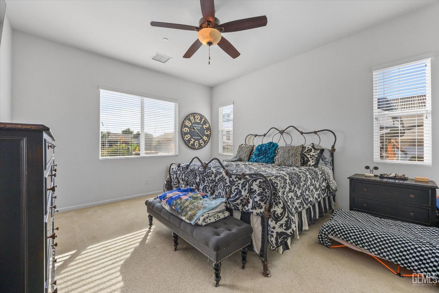 Undisclosed Address Bakersfield, CA 93314 - Photo 28 of 56 a bedroom with a bed and a window