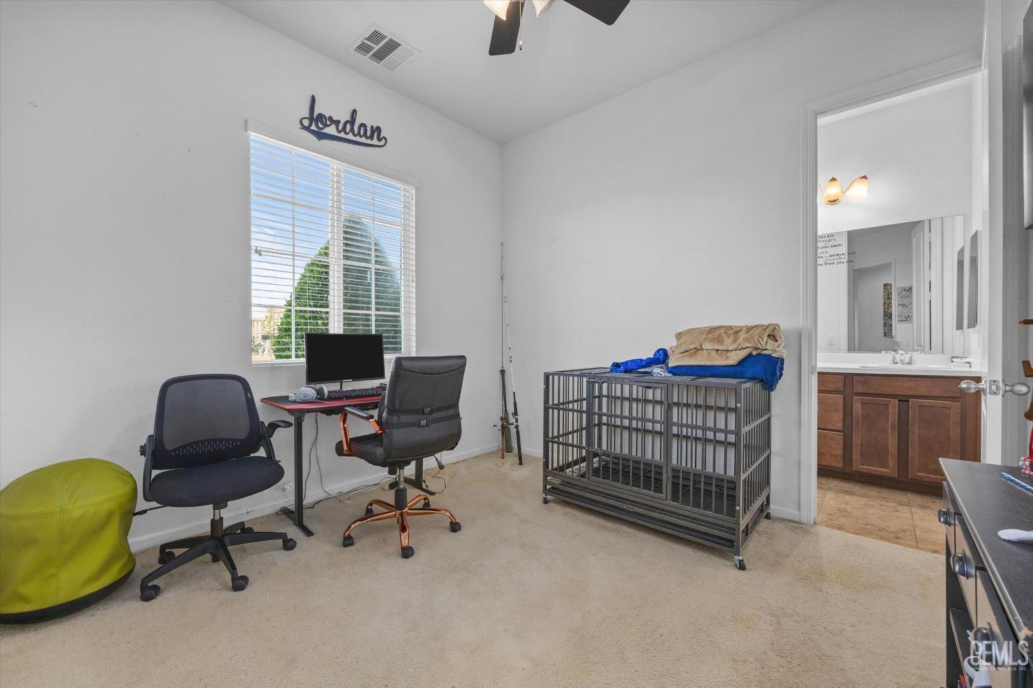 Undisclosed Address Bakersfield, CA 93314 - Photo 33 of 56 a bedroom with furniture and a window