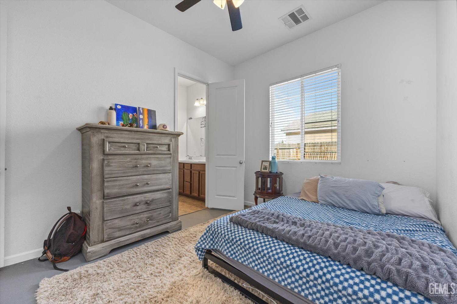 Undisclosed Address Bakersfield, CA 93314 - Photo 36 of 56 a bedroom with a bed and a television