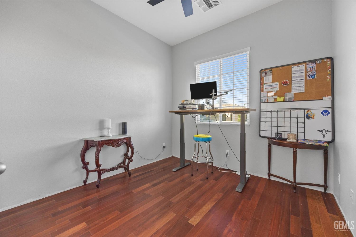 Undisclosed Address Bakersfield, CA 93314 - Photo 39 of 56 a workspace with furniture and window