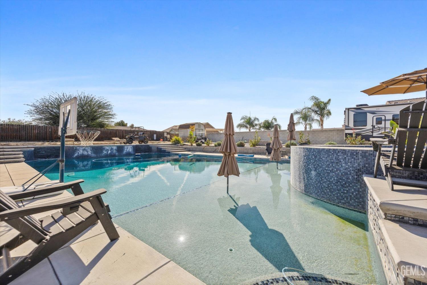 Undisclosed Address Bakersfield, CA 93314 - Photo 45 of 56 a view of a lake with couches and city view