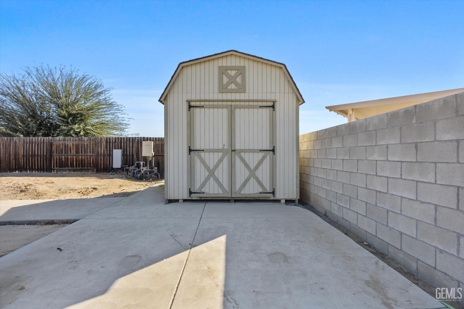 Undisclosed Address Bakersfield, CA 93314 - Photo 50 of 56 a view of a wooden house with a outdoor space