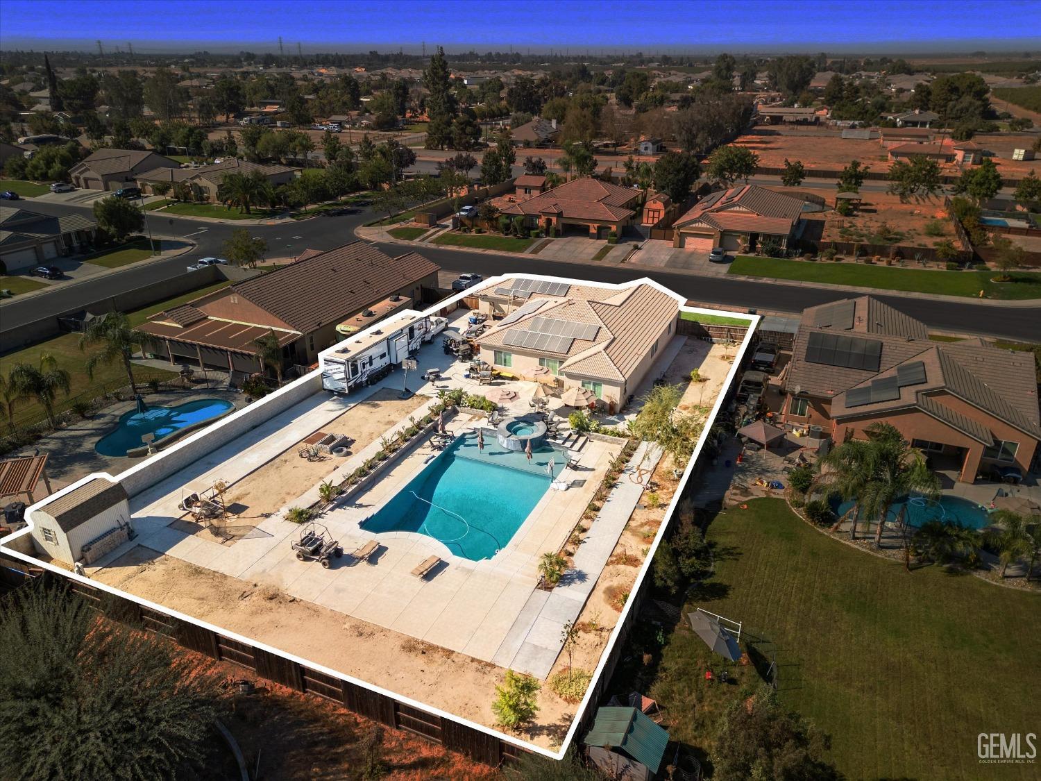 Undisclosed Address Bakersfield, CA 93314 - Photo 55 of 56 an aerial view of residential houses with outdoor space