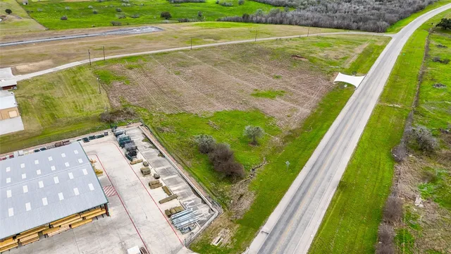 a view of a swimming pool with a garden
