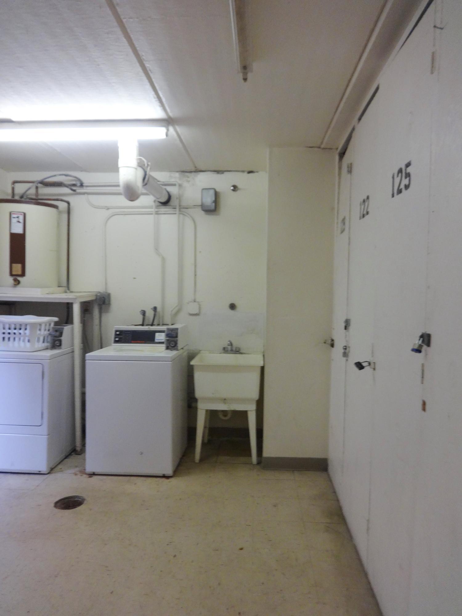 550 Southwest 2nd Avenue, Unit 129 Boca Raton, FL 33432 - Photo 18 of 23 Laundry room--just steps away!