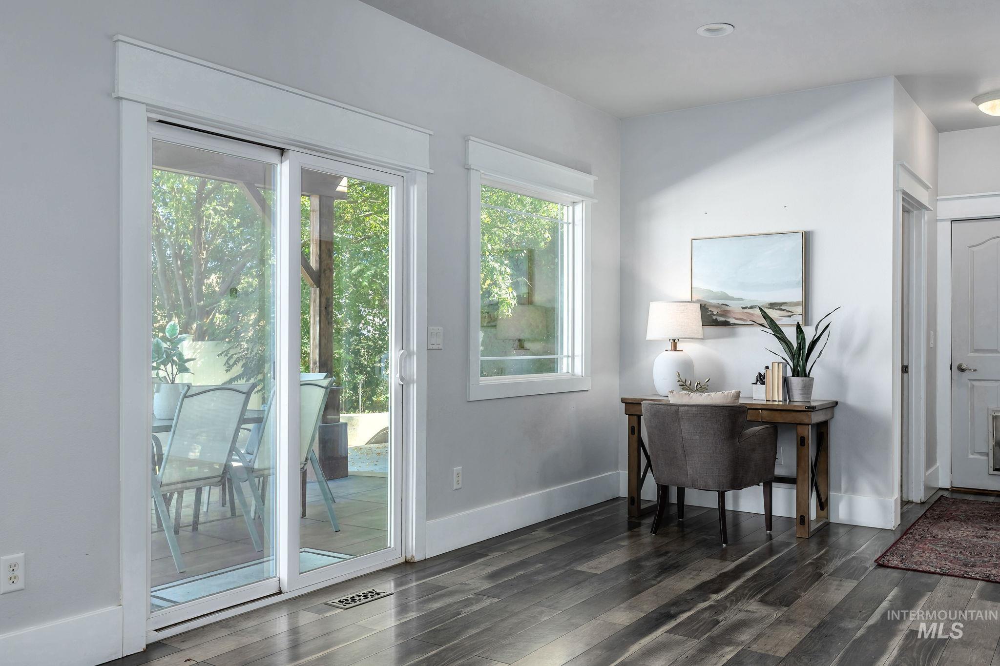 2912 East Bonfire Lane Eagle, ID 83616 - Photo 16 of 50 Doorway to outside with wood finished floors and recessed lighting