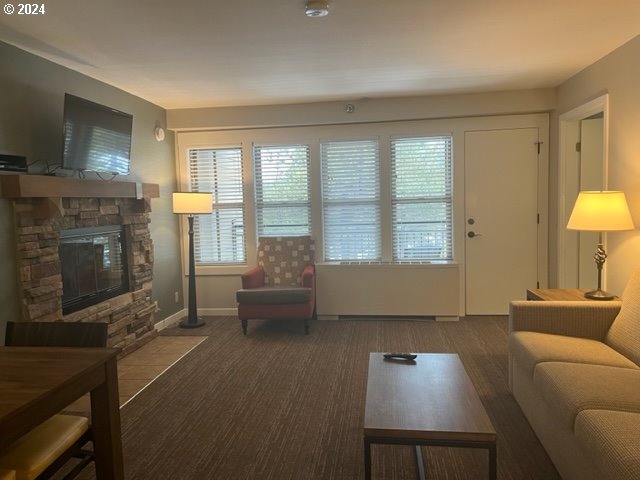 18575 Southwest Century Drive, Unit 1721&22 Bend, OR 97702 - Photo 17 of 40 a living room with furniture and a fireplace