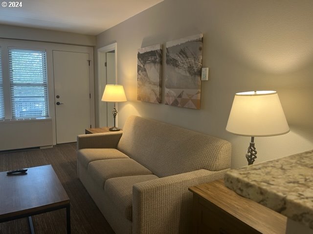 18575 Southwest Century Drive, Unit 1721&22 Bend, OR 97702 - Photo 18 of 40 a bed room with a bed and a lamp