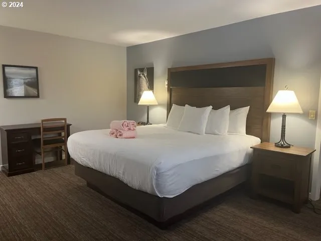 a bedroom with a bed and a closet