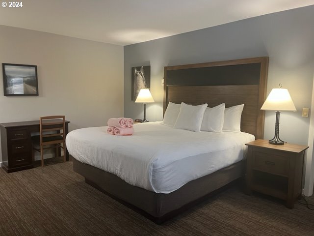 18575 Southwest Century Drive, Unit 1721&22 Bend, OR 97702 - Photo 25 of 40 a bedroom with a bed and a closet