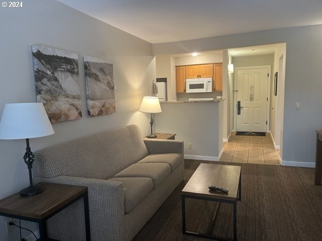 18575 Southwest Century Drive, Unit 1721&22 Bend, OR 97702 - Photo 32 of 40 a living room with furniture and a window