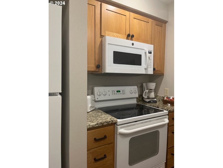 18575 Southwest Century Drive, Unit 1721&22 Bend, OR 97702 - Photo 7 of 40 a utility room with dryer and washer