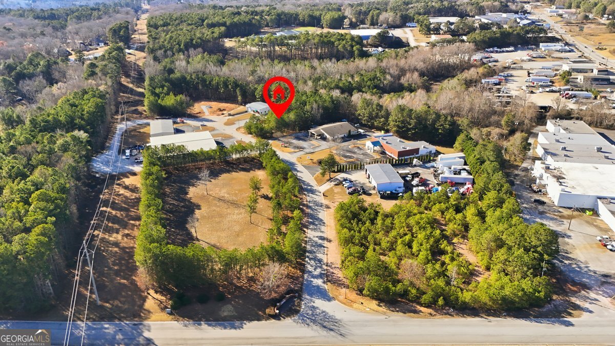 112 Redding Drive Bremen, GA 30110 - Photo 15 of 20 a aerial view of a house with a yard and garden