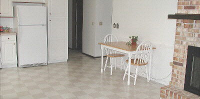 11873 Tresemer Road Roscoe, IL 61073 - Photo 3 of 6 an entryway with table and chair
